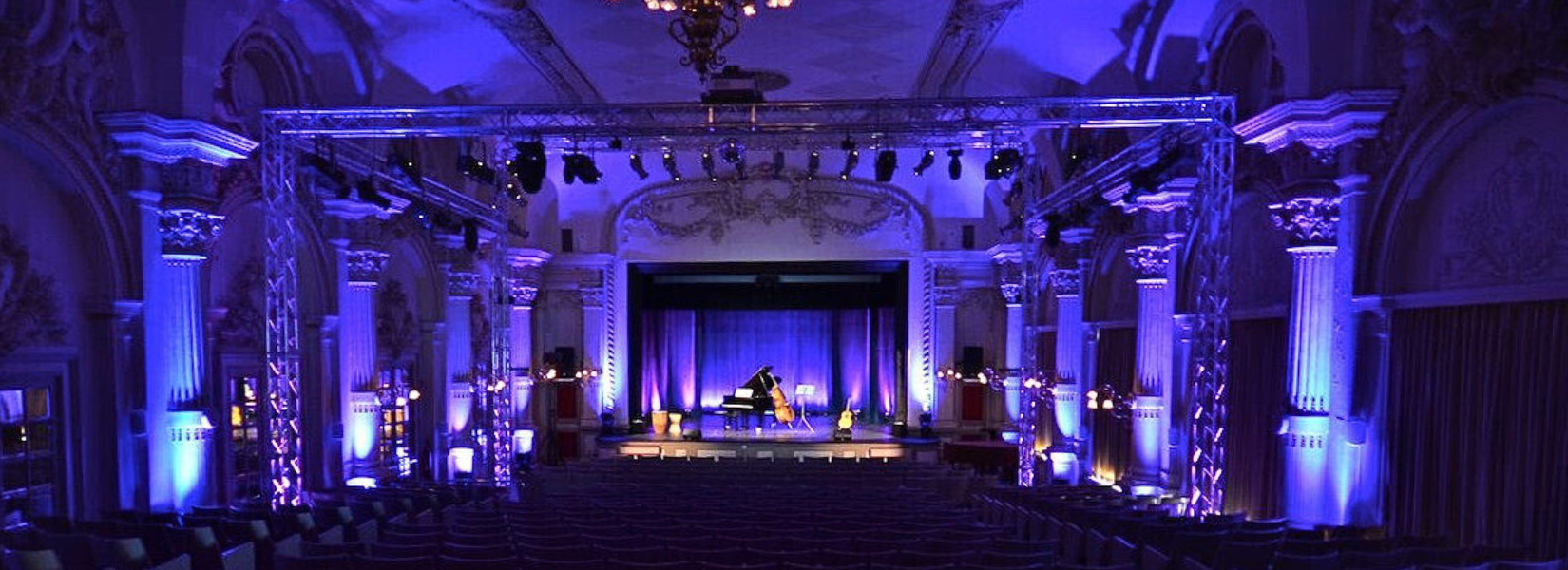 Caux Palace theatre blue light piano & cello