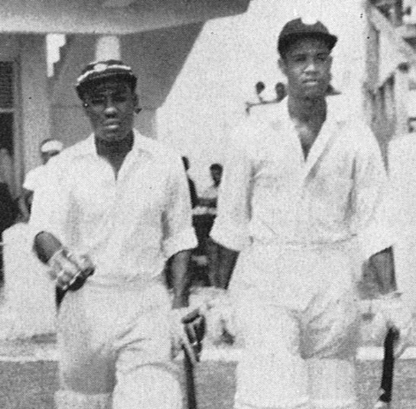 Conrad Hunte (left) and Gary Sobers walk out to bat against Pakistan 1958