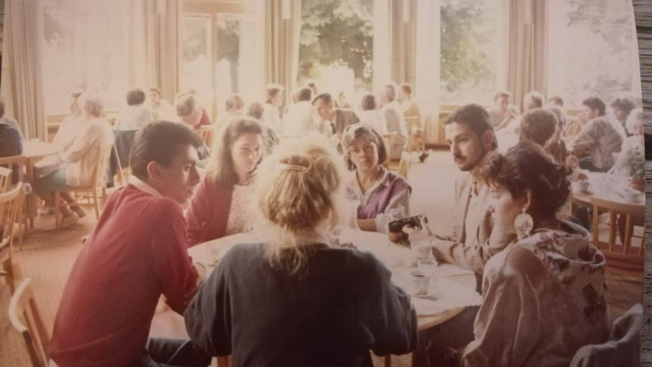 Joe Hakim 1988 Caux Joe in red pullover