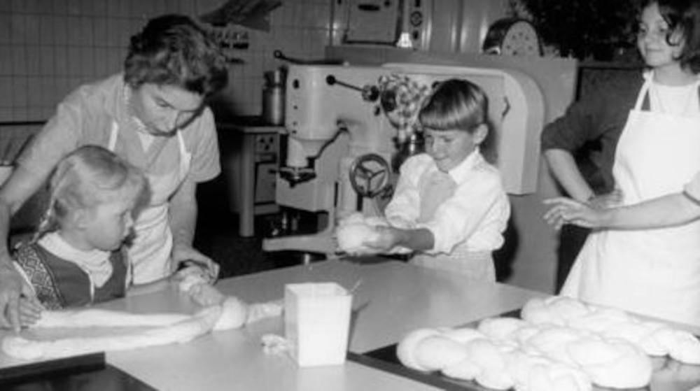 Hildi and children in the baking kitchen