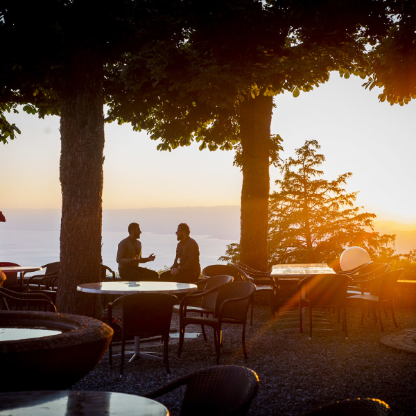 Conversation discussion terrace sunset