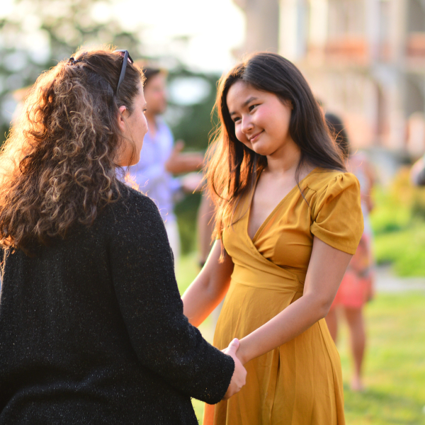 Interaction group young people holding hands