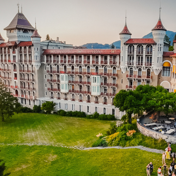 Caux Palace HATCH people in garden drone 2023 banner