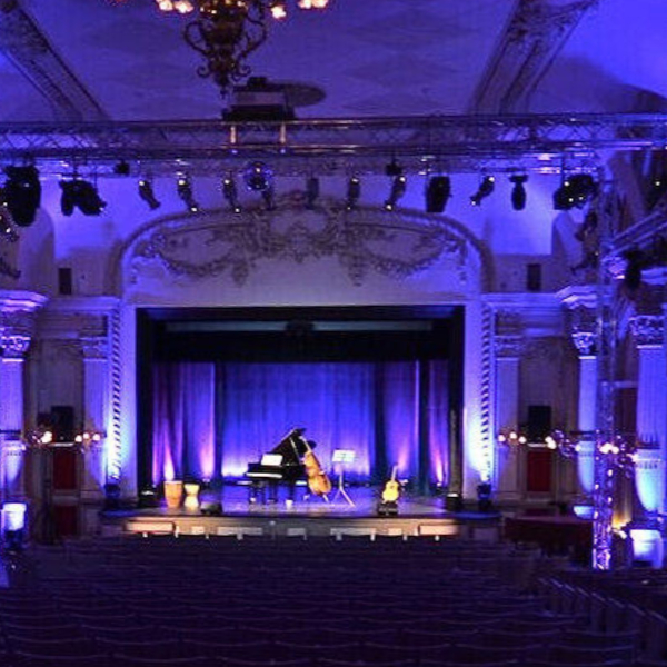 square Caux Palace theatre blue light piano and cello