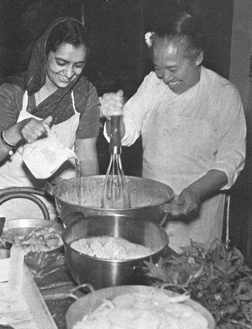 Daw Nyein Tha and Maharani of Kutch in Asian kitchen in Caux