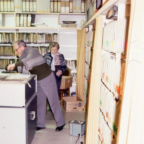 Erica Utzinger and her husband Beni working in the archives